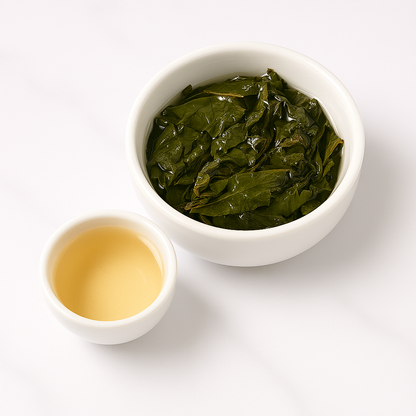 Brewed Alishan high mountain oolong tea with bright golden liquor by Affair Tea